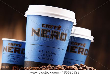 Composition With Cups Of Caffe Nero Coffee And Beans