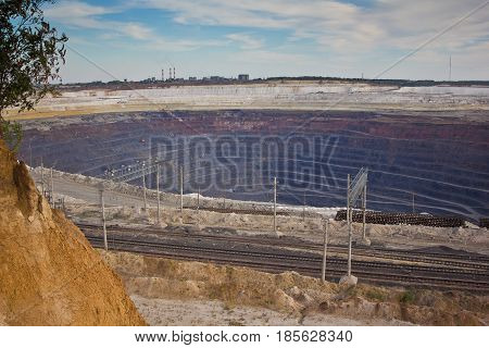 Open pit of the Stoilensky Mining and Processing Plant and railway