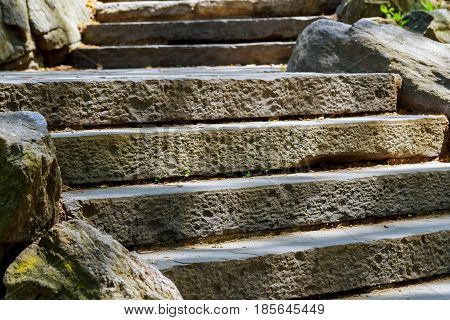 beautiful old stone stairs natural dark stone diabase with stone steps in summer park