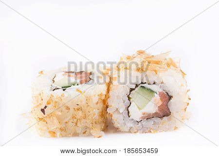 Japanese Cuisine, Sushi Set: Roll With Shavings Of Tuna, Salmon, Cream Cheese, Cucumber On A White B