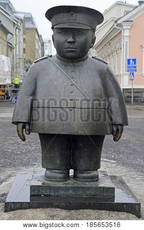 Oulu, Finland - April 11, 2017: Statue of policeman Bobby on market square in Oulu, Finland