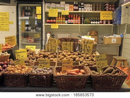 Oulu, Finland - April 11, 2017: stand with vegetables and beverages on street market in Oulu, Finland