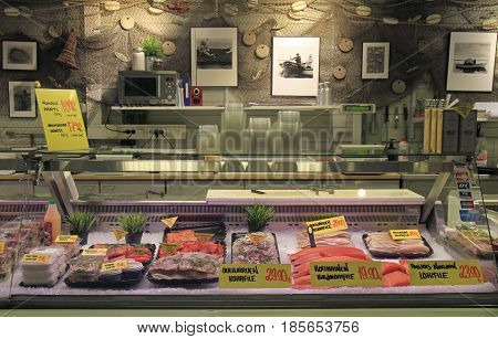 Oulu, Finland - April 11, 2017: red and white meat of fish at the european market in Oulu, Finland