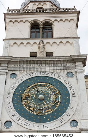 Clock tower building of medieval origins overlooking Piazza dei Signori in Padova Italy