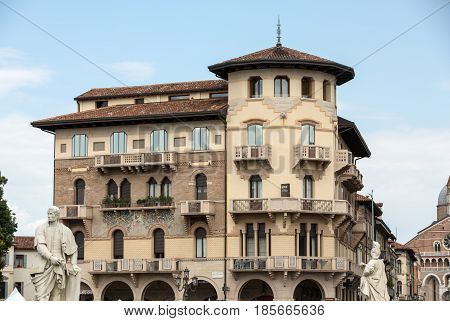 PADUA ITALY - MAY 3 2016: The old residential houses decorated with mosaic tiles and pattern maid from bricks Prato della Valle in Padua. Italy