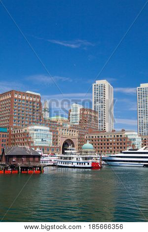 Boston Massachsetts USA - July 2 2016: Boston skyline from Seaport boulevard bridge.