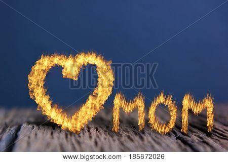 Mother's DayLove mom flame style on the wooden background