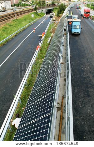 Workers During The Installation Of Solar Panels