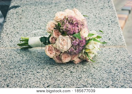 Wedding bouquet of flowers, bride holding flowers
