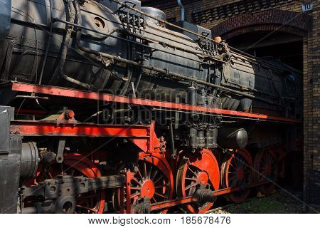 BERLIN - APRIL 21: Detail of an old steam locomotive Spring Festival Exhibition in the Rail yard Schoeneweide April 21 2013 in Berlin Germany