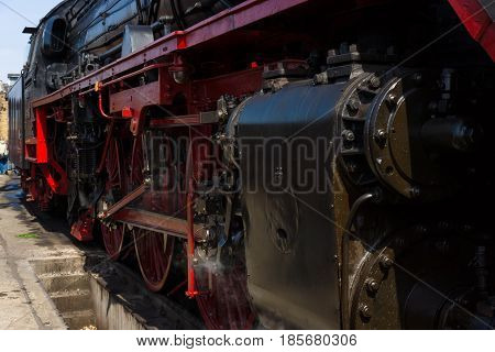 BERLIN - APRIL 21: Detail of an old steam locomotive Spring Festival Exhibition in the Rail yard Schoeneweide April 21 2013 in Berlin Germany
