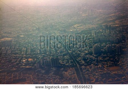 Journey By Air. A View Of City From Plane.