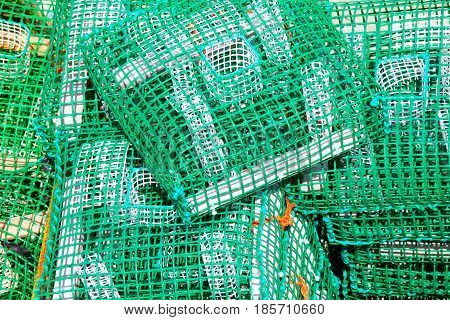 Lobster pots and crab pots drying in the sun on the pier Cascais Portugal