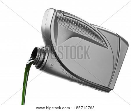 The oil for the engine flows the open plastic canister the green motor grease with molygen