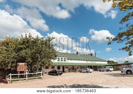 GRABOUW SOUTH AFRICA - MARCH 27 2017: Information board for the Sir Lowrys Pass at the Orchards Farm Stall in Grabouw