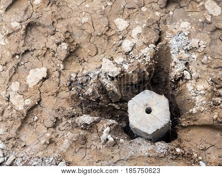 Hexagon concrete pillar in the deep hole for extension area of the urban house.