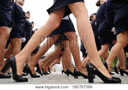 Orel Russia - May 9 2017: Celebration of 72th anniversary of the Victory Day (WWII). Military women marching in short uniform skirts on heels in a row closeup
