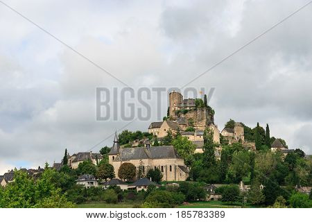 The ancient medieval castle on top of the hill above the village of Turenne one of the prettiest towns in France.