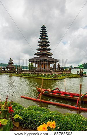 Pura Ulun Danu Batur Temple In Lake With Flowers. Bali, Indonesia.
