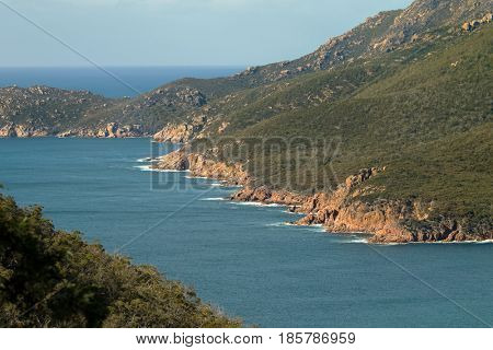 Closeup of rocky seashore of Wineglass Bay, Tasmania's famous east coast in Freycinet National Park, Tasmania island, Australia