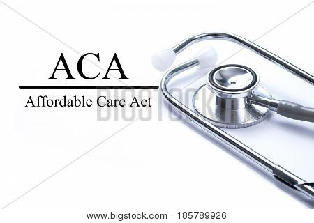 Page with ACA (Affordable Care Act) on the table with stethoscope medical concept