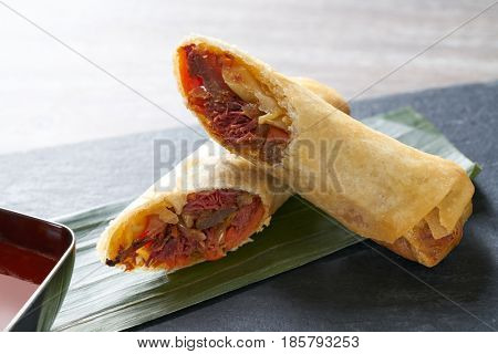 Duck rolls with sweet and sour sauce Asian cuisine recipe