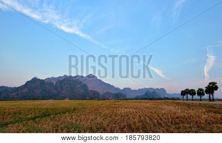 Beautiful panoramic view of Mount Zwegabin and harvested rice fields Hpa-An Myanmar (Burma)