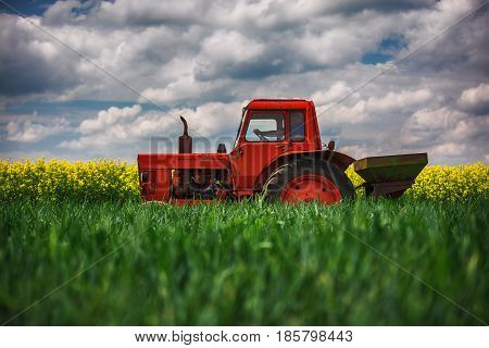Red Tractor In A Field