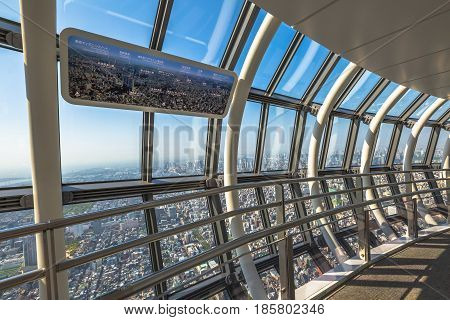 Tokyo, Japan - April 19, 2017: The spiral ramp of Tembo Gallery observation deck, the highest skywalk in the world. Tokyo skyline of Sumida district from Tokyo Skytree.