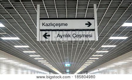 Istanbul, Turkey - February 21, 2017:  Istanbul metro signs showing ways to Kazlicesme and Ayrilik Cesmesi stations