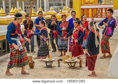 NAKORN PHANOM THAILAND - FEBRUARY 14, 2015 : Thai northeastern Phutai people show ancient rite of worship to household spirit in Phutai world event day in Renunakorn of Nakorn Phanom, Thailand.