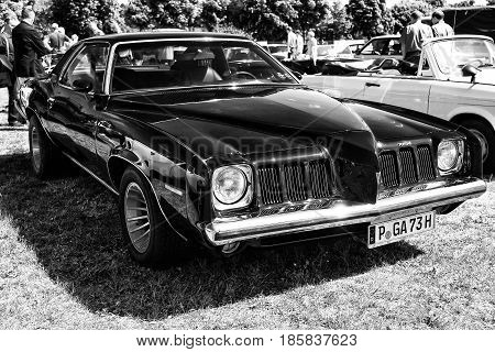 PAAREN IM GLIEN GERMANY - MAY 19: Mid-size car Pontiac Grand Am (black and white) The oldtimer show in MAFZ May 19 2013 in Paaren im Glien Germany