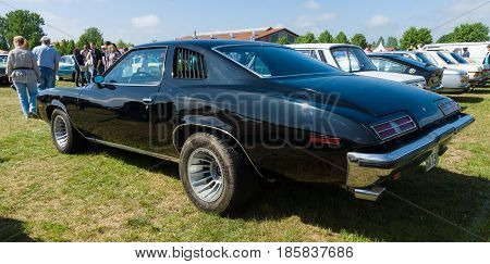 PAAREN IM GLIEN GERMANY - MAY 19: Mid-size car Pontiac Grand Am rear view The oldtimer show in MAFZ May 19 2013 in Paaren im Glien Germany