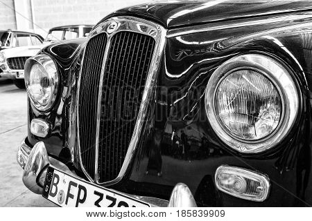 PAAREN IM GLIEN GERMANY - MAY 19: Small family car Lancia Appia Berlina 1st series (1953) black and white 