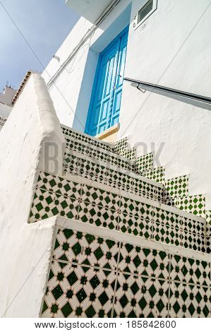 view of stairs of one house in frigiliana pueblo blanco spain