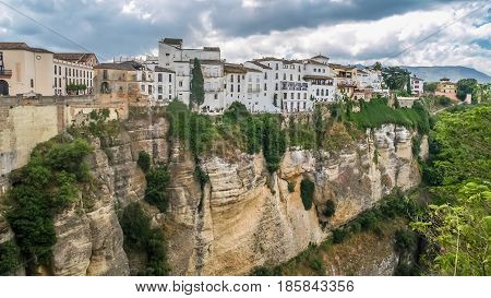 view of buildings over cliff in ronda spain