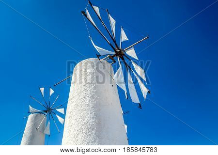 view of an old mill in crete near lasithi plateau