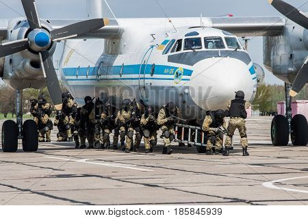 Kiev Region Ukraine - April 24 2012: Special counter-terrorist forces train to assault the plane captured by the terrorists