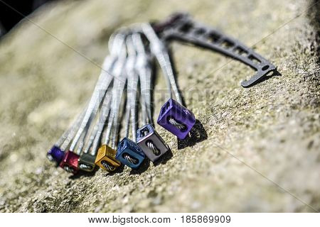 Sokoliki Poland may 3 2017: Set of climbing rocks wallnuts fot trad lying on a rock.