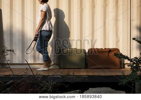 Woman traveler photographer holiday lifestyle trip