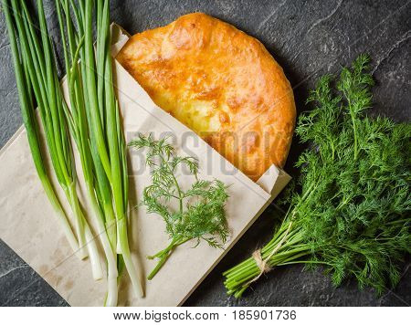 Georgian Hot Khachapuri Bread On A Dark Background. Place For The Text.