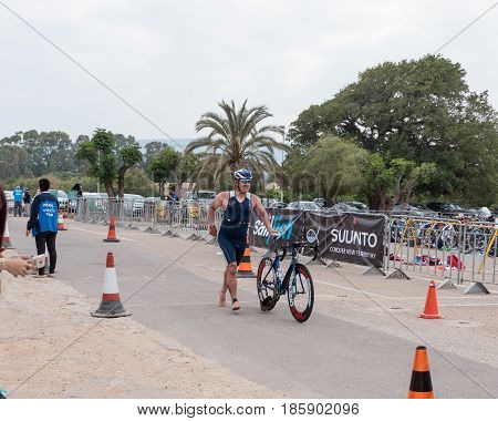 Nahariyya Israel - May 06 2017 : Participant of the annual triathlon finishes after a bicycle ride to Ahziv near the town of Nahariya