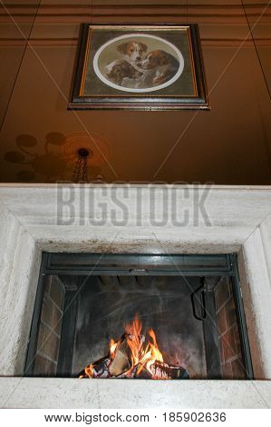 Leukerbad Switzerland - 2 October 2002: Fire burning in a fireplace of a hotel