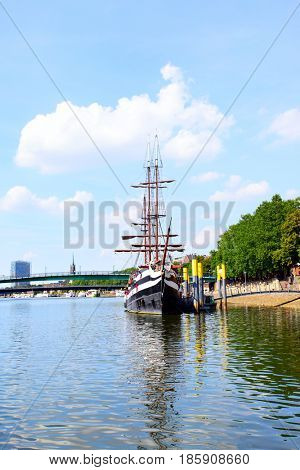 Old sailing ship on Weser river in Old town of Bremen, Germany