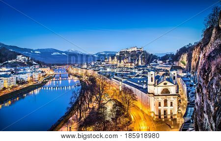 Panoramic View Of Historic City Of Salzburg With Festung Hohensalzburg And River Salzach During Blue