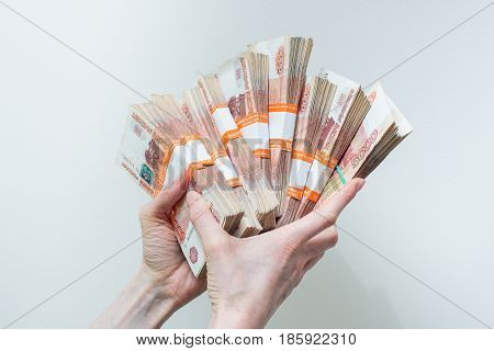 Hand Holding Many Of The Russian Banknotes