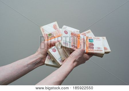 Hand Holding Many Of The Russian Banknotes