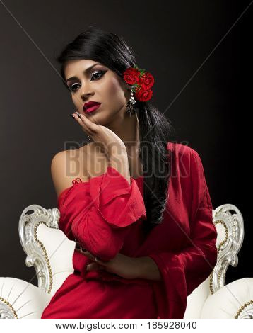young attractive brunette posing make-up in red shirt