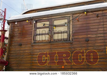 Circus wooden vintage caravan with painted spanish circo lettering