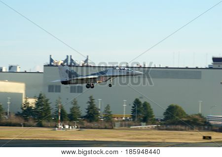 EVERETT, WASHINGTON, USA - JAN 26th, 2017: A MiG-29UB during a low pass athe Boeing factory site at Snohomish County Airport or Paine Field.